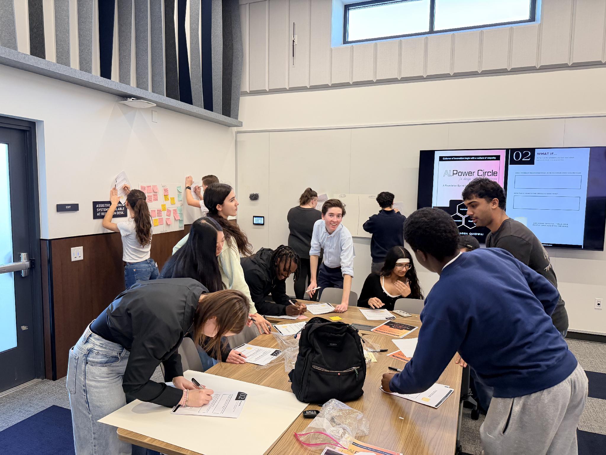 Students working together in a Portrait session